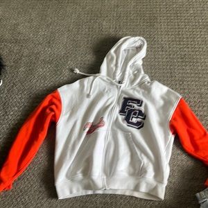 Orange sleeve white zip up